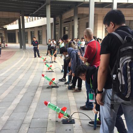 Students were preparing to launch water rockets.